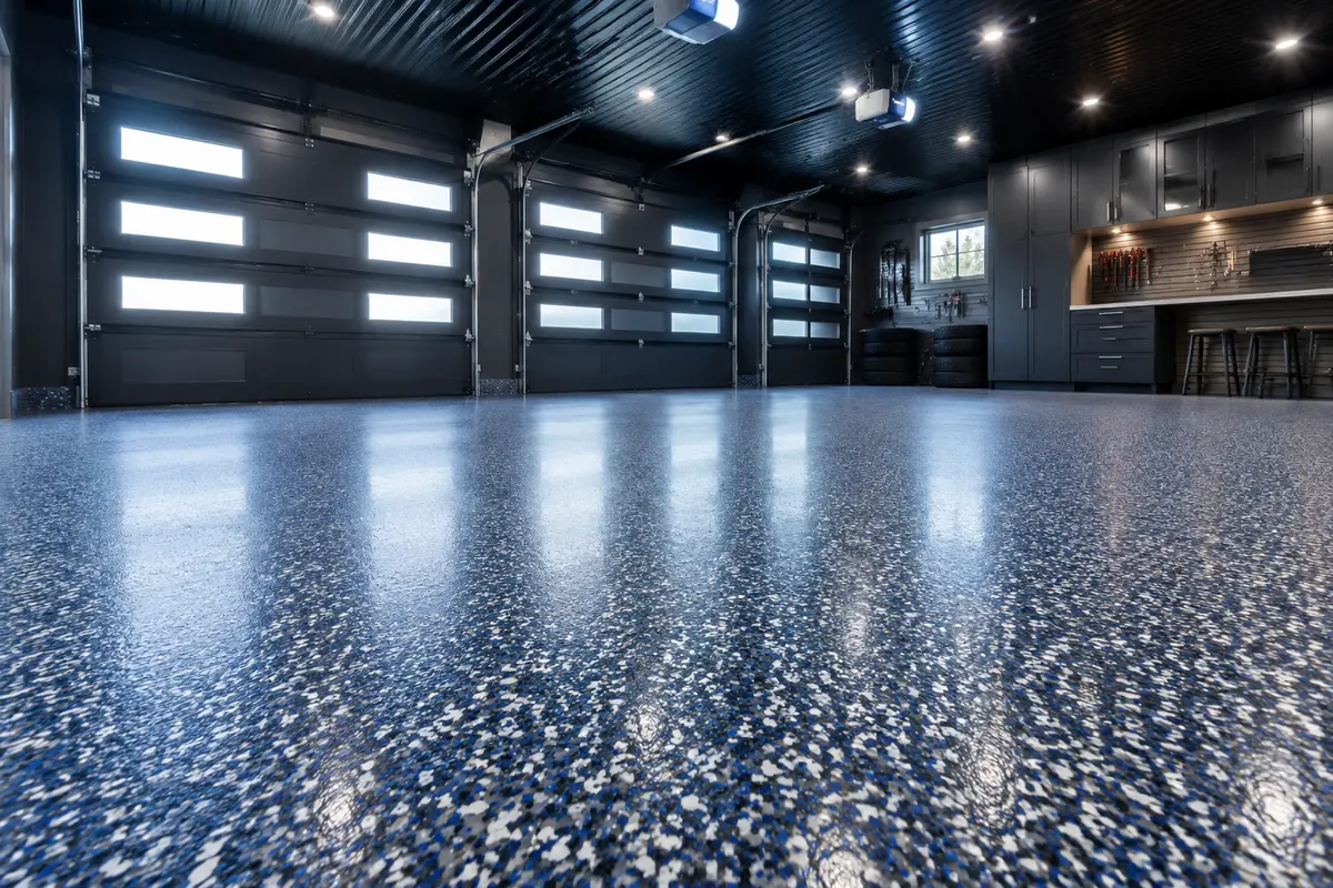 Blue epoxy flake three-car garage inspiration